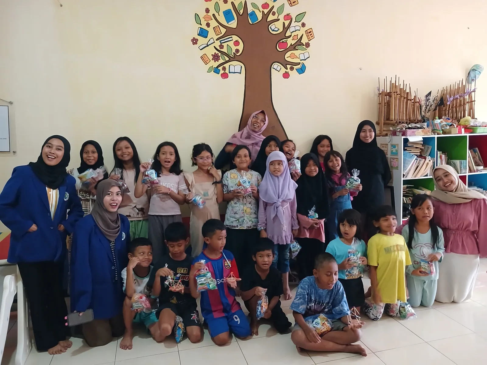 Children and volunteers at a community learning activity