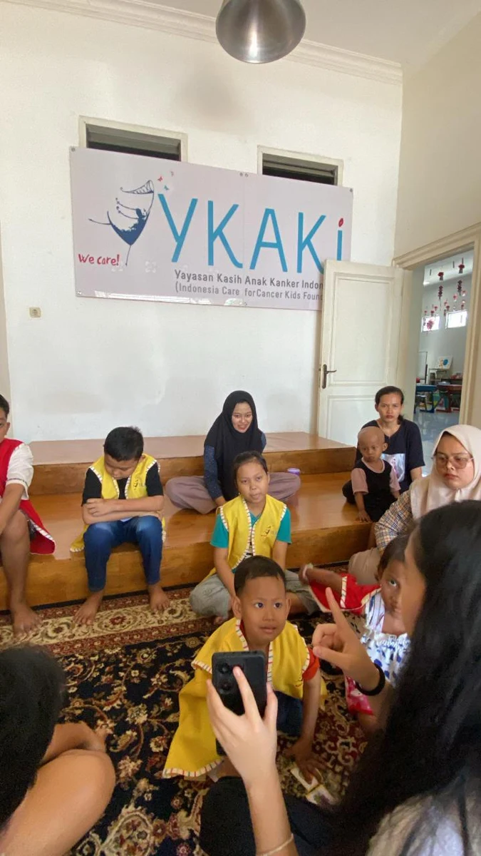 Children and volunteers gathered for a community activity in October 2024